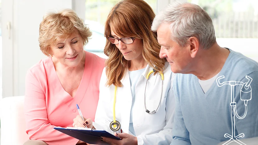 a doctor showing a woman and a man something on a tablet
